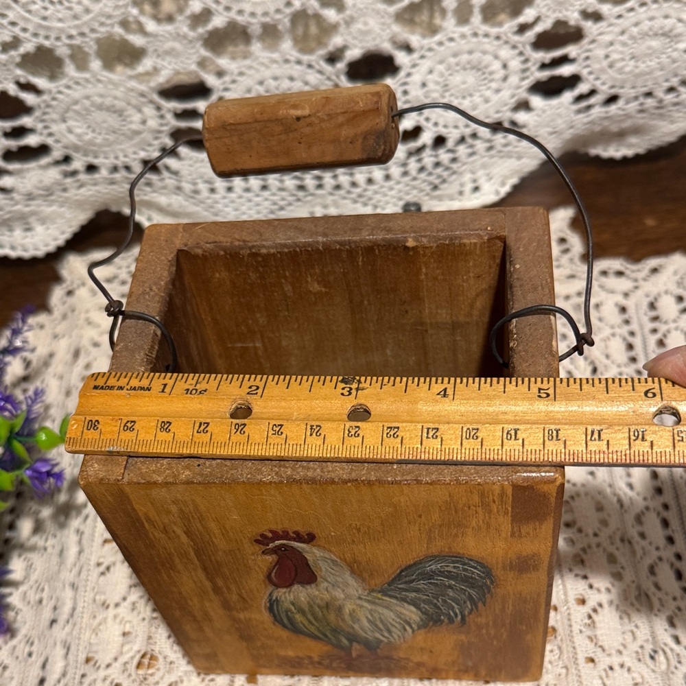 Wooden Container with a rooster holding Purple and Green Faux Flowers. - Picture 7 of 12